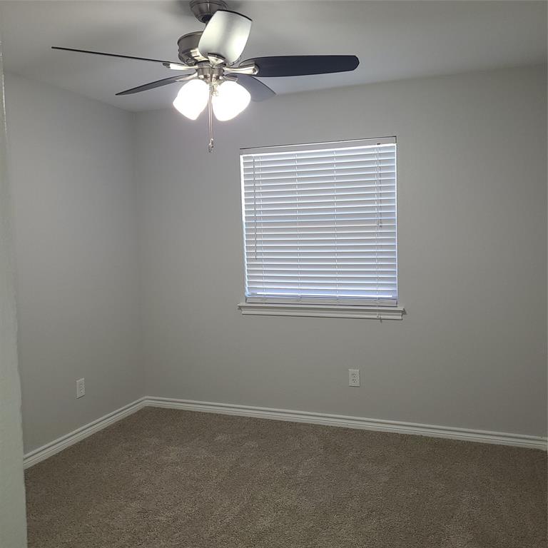 406 Epps Road Palmer, TX 75152 - Photo 19 of 36 a view of an empty room with a window
