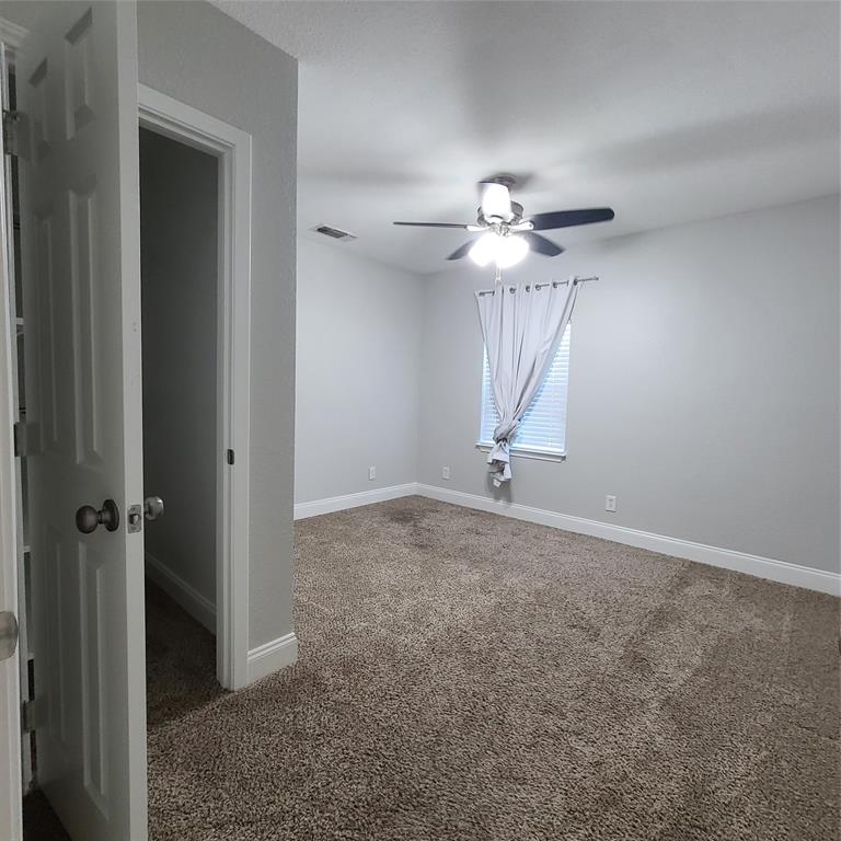 406 Epps Road Palmer, TX 75152 - Photo 22 of 36 wooden floor in an empty room with a window
