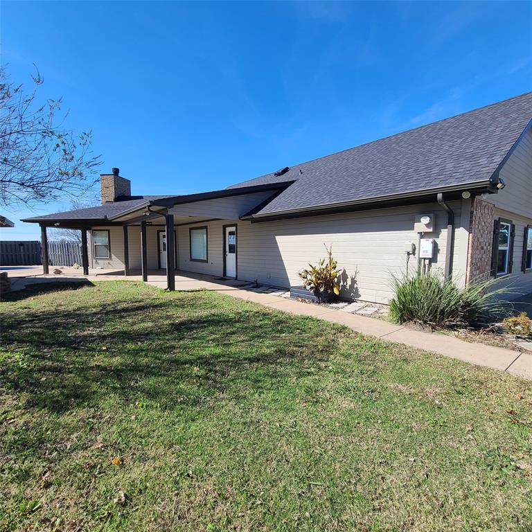 406 Epps Road Palmer, TX 75152 - Photo 24 of 36 a front view of a house with a garden
