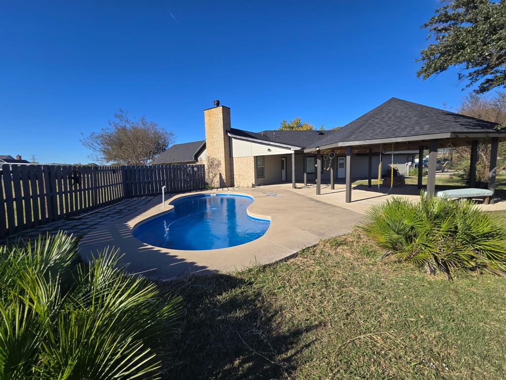 406 Epps Road Palmer, TX 75152 - Photo 26 of 36 a front view of a house with a yard