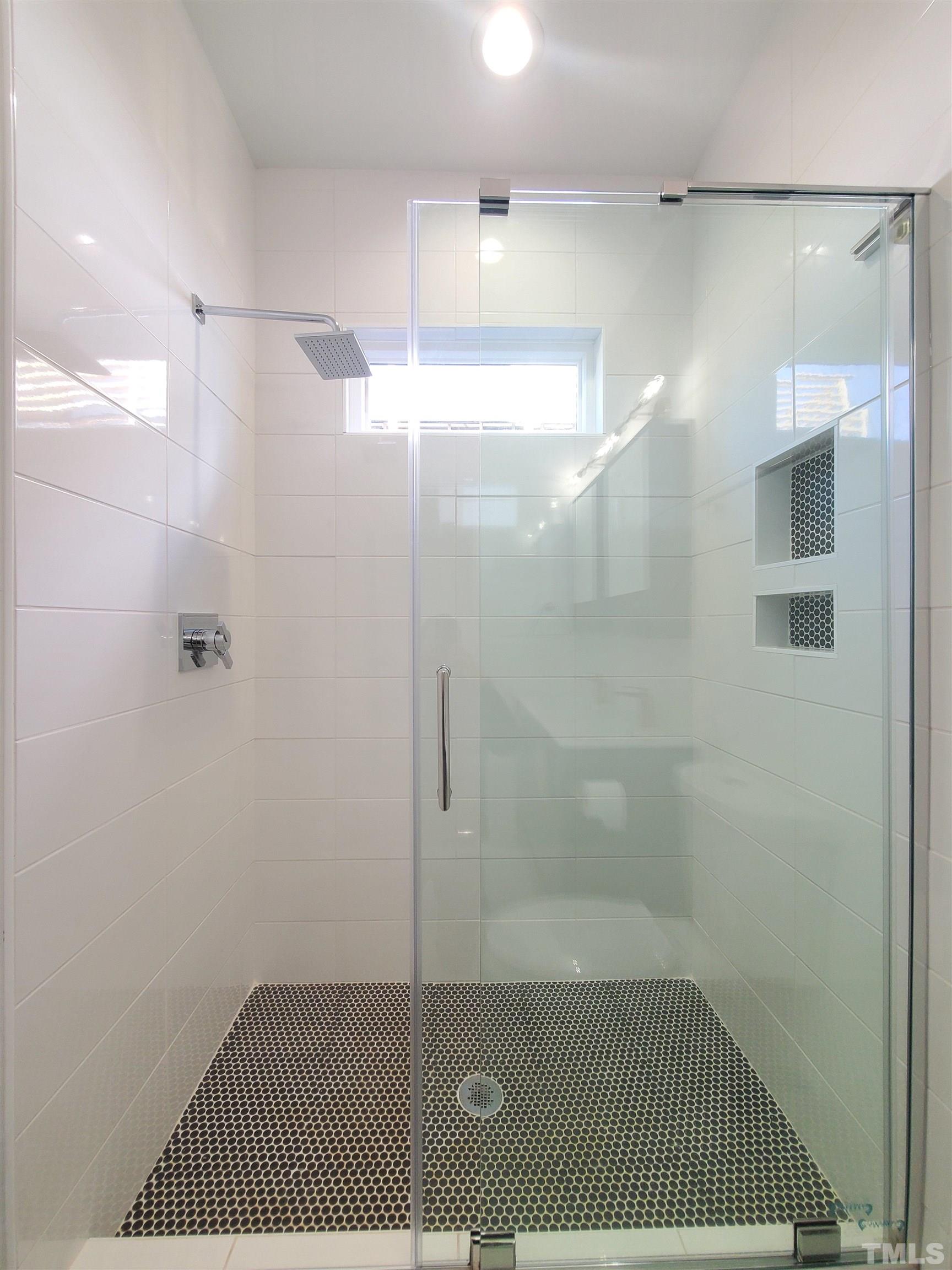 221 Bledsoe Avenue Raleigh, NC 27601 - Photo 12 of 28 a bathroom with a shower