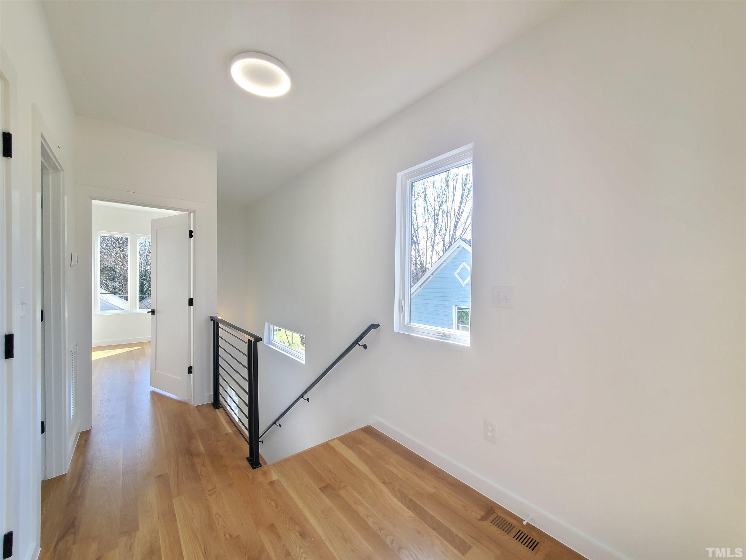 221 Bledsoe Avenue Raleigh, NC 27601 - Photo 15 of 28 a view of an entryway with wooden floor