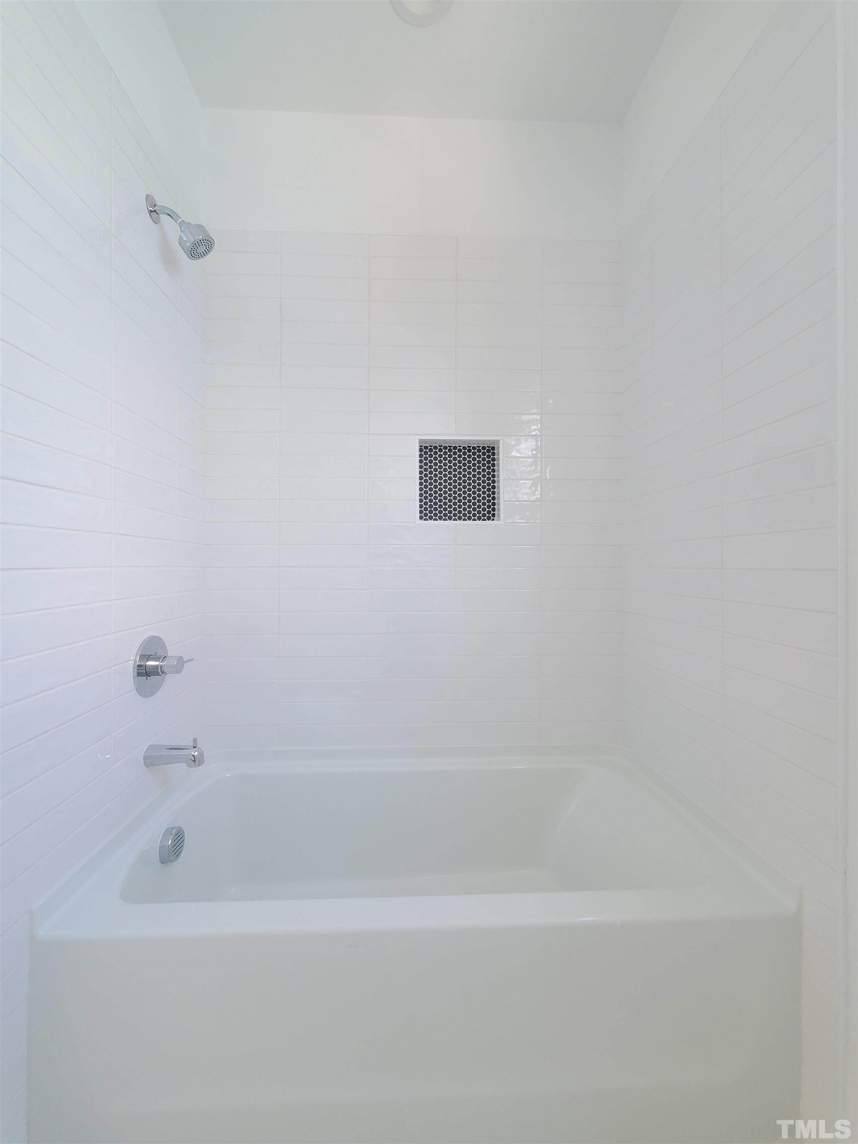 221 Bledsoe Avenue Raleigh, NC 27601 - Photo 19 of 28 a bathroom with a bathtub