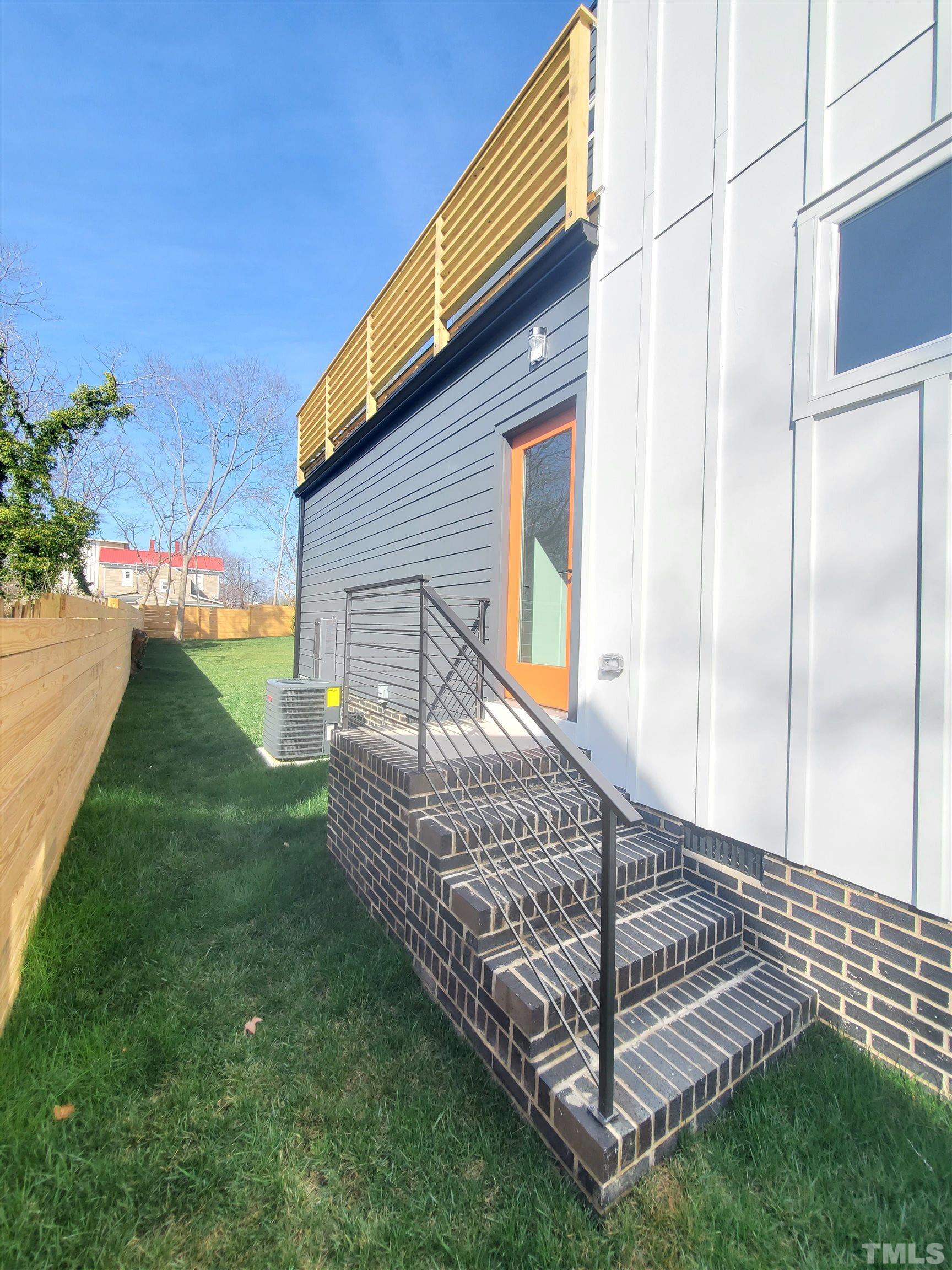 221 Bledsoe Avenue Raleigh, NC 27601 - Photo 27 of 28 a view of a backyard with a garden