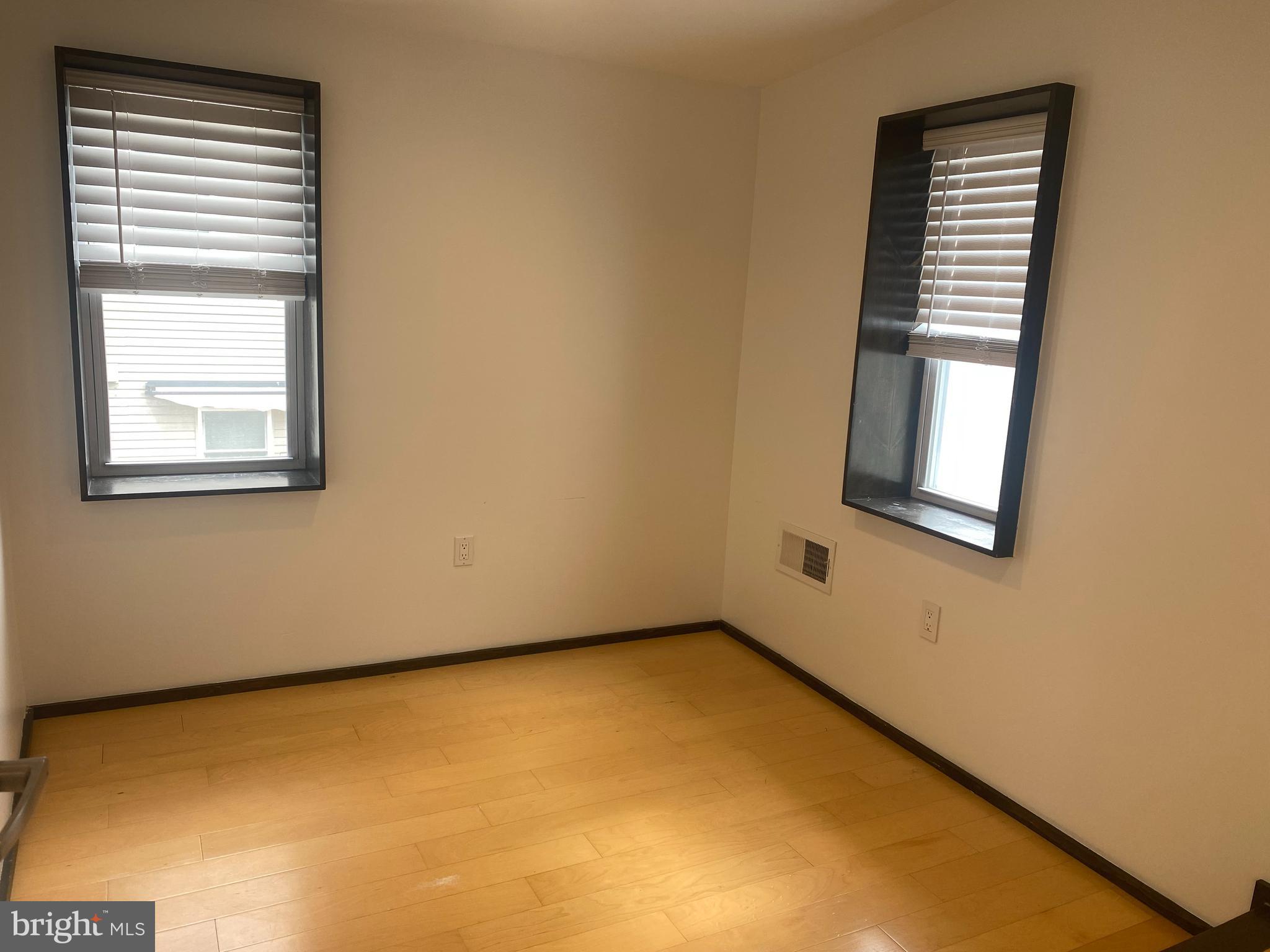 2641 Tulip Street Philadelphia, PA 19125 - Photo 13 of 37 a view of an empty room with a window
