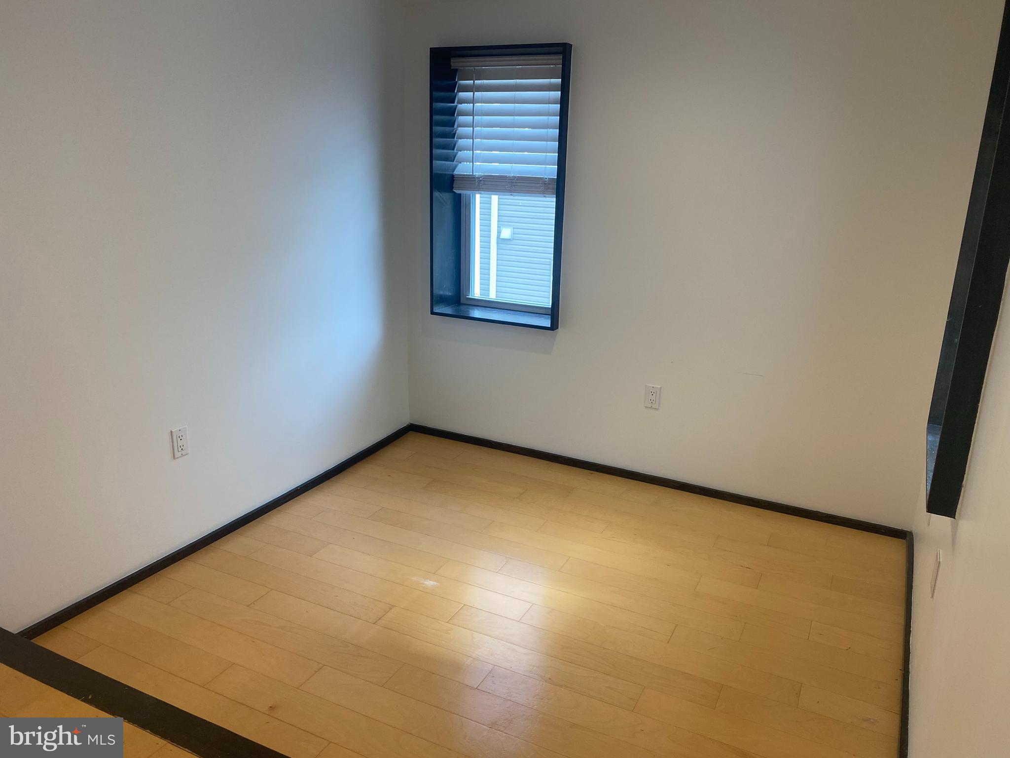 2641 Tulip Street Philadelphia, PA 19125 - Photo 16 of 37 an empty room with windows