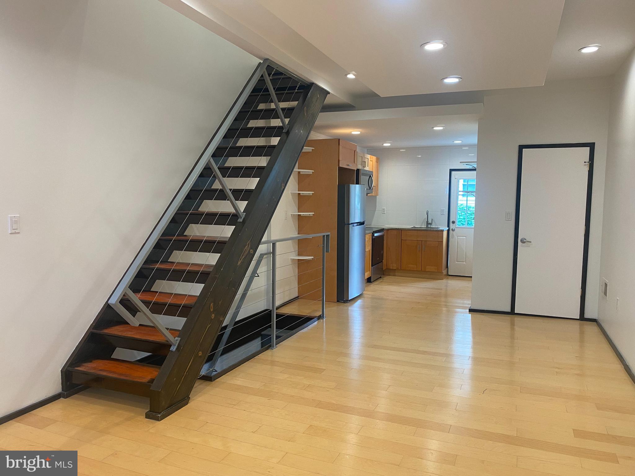 2641 Tulip Street Philadelphia, PA 19125 - Photo 2 of 37 a view of entryway and hall with wooden floor
