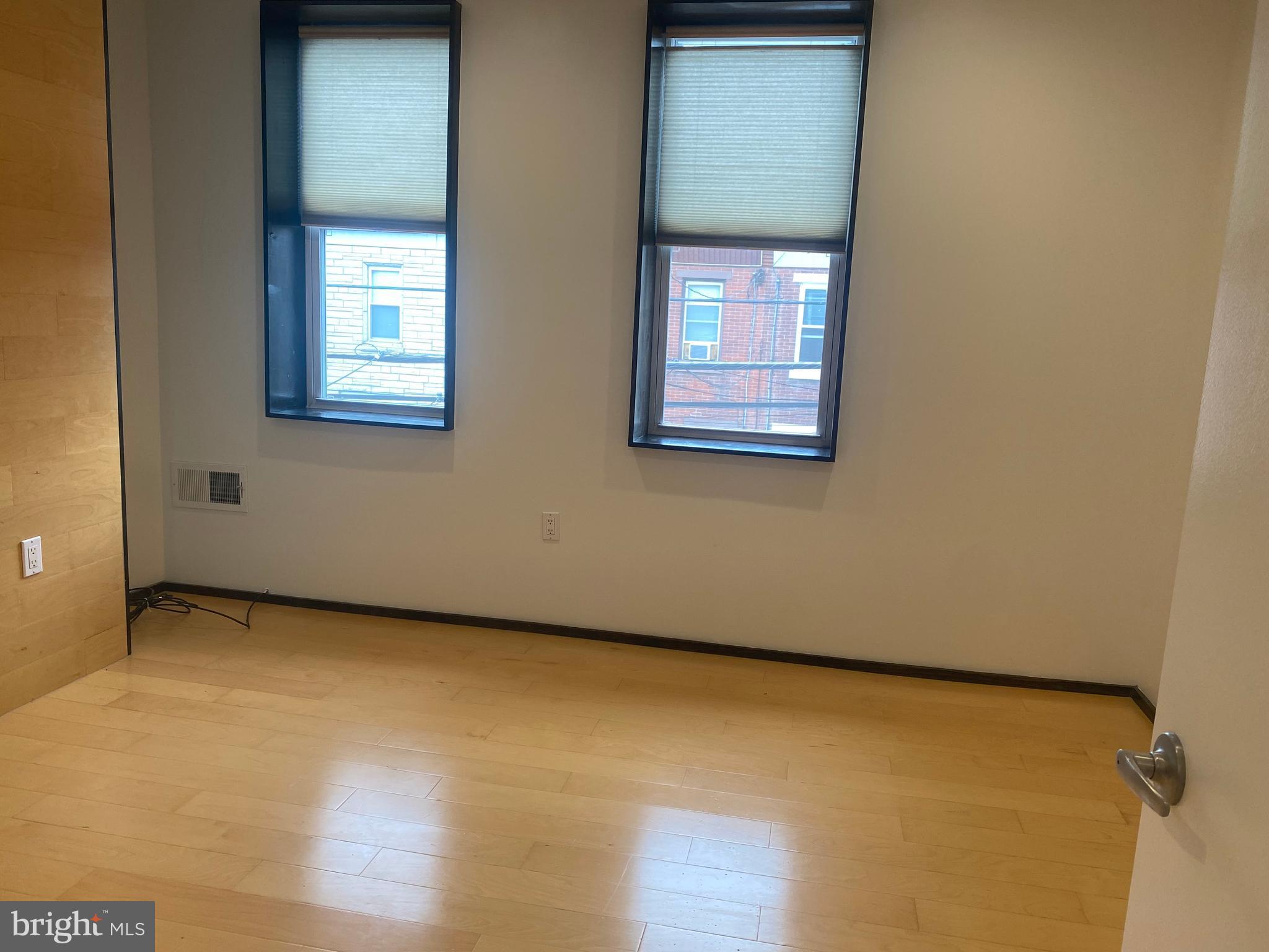 2641 Tulip Street Philadelphia, PA 19125 - Photo 25 of 37 an empty room with windows