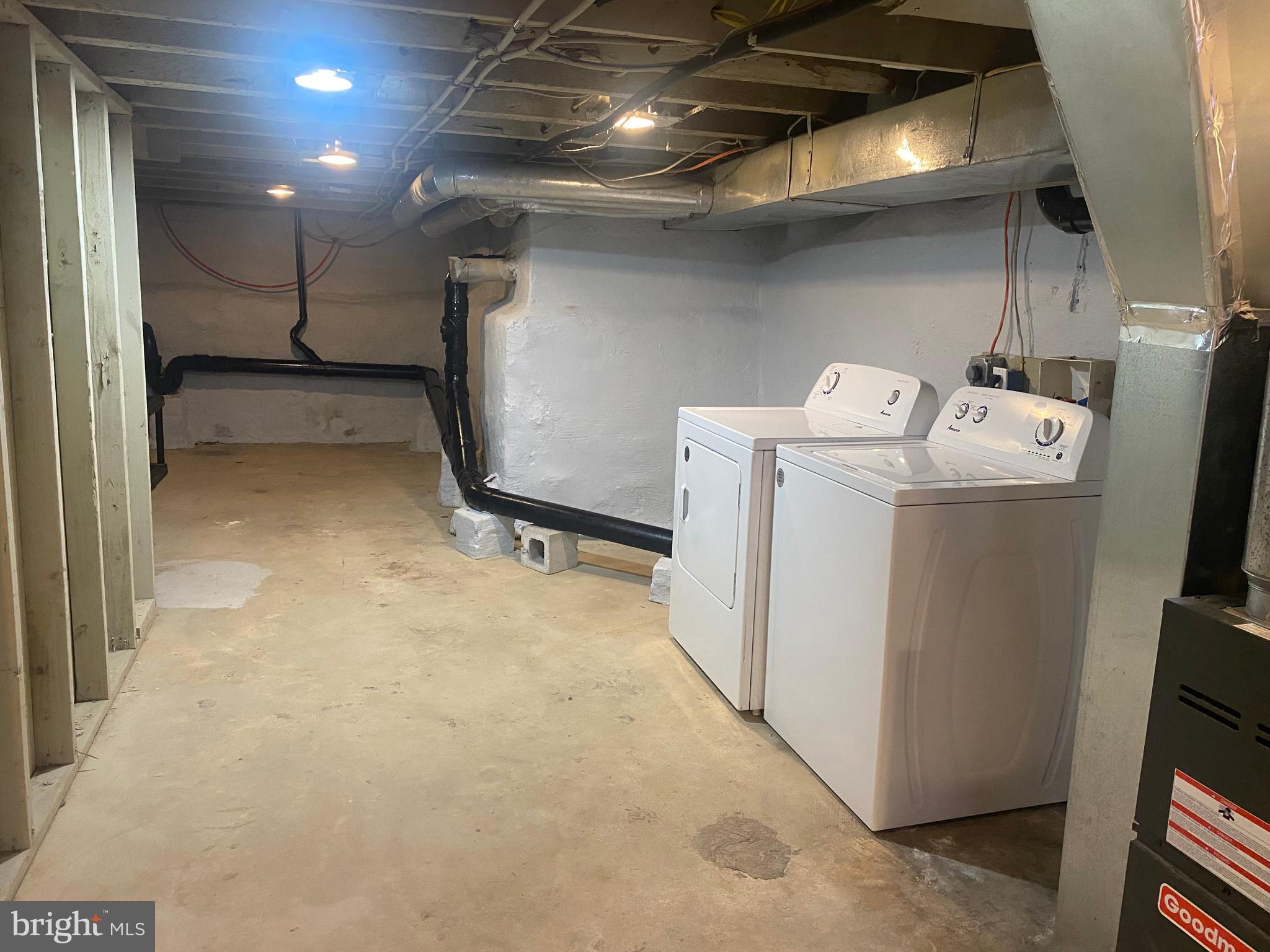2641 Tulip Street Philadelphia, PA 19125 - Photo 28 of 37 a view of storage and utility room with washer and dryer