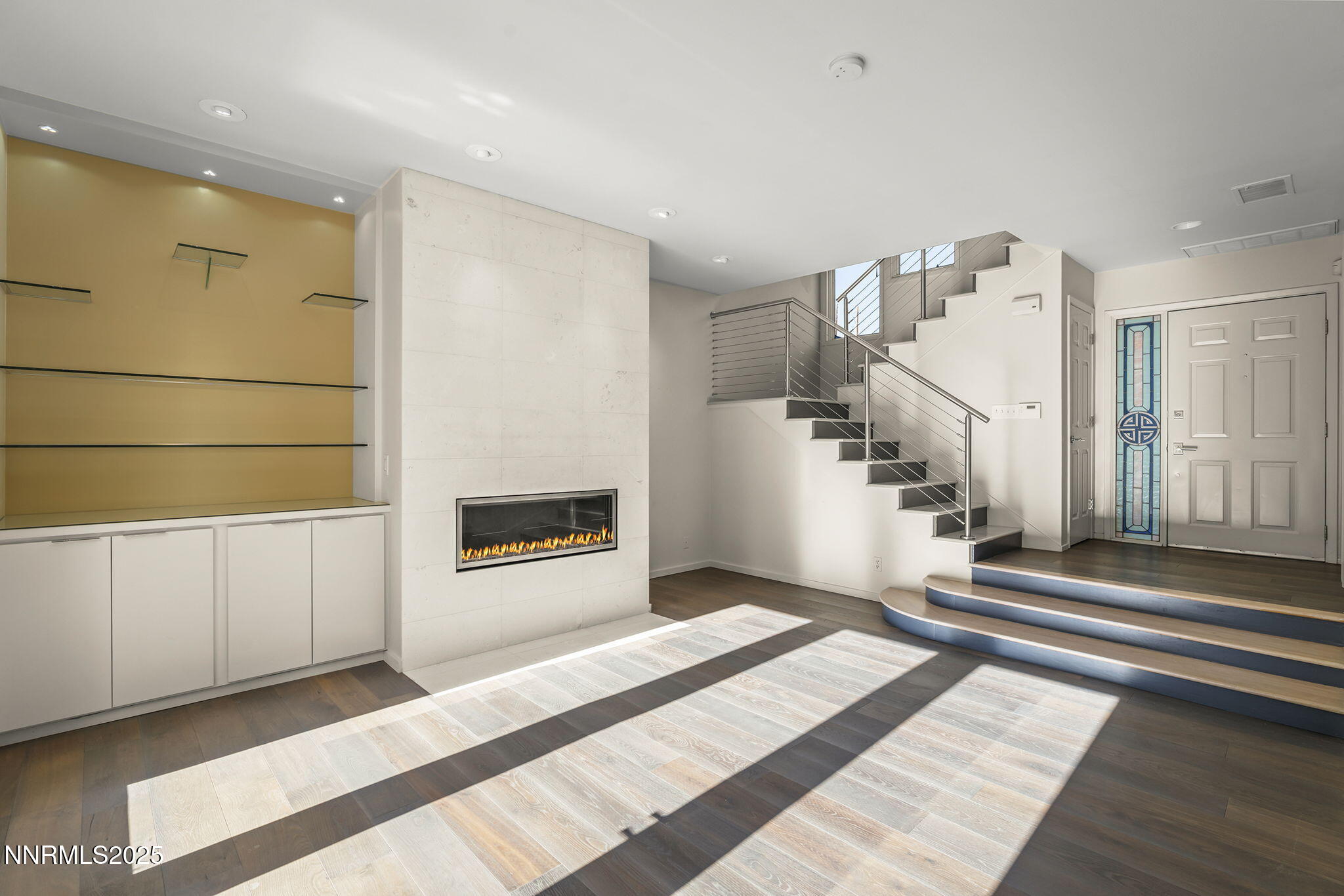 6302 Green Ranch Road Reno, NV 89519 - Photo 4 of 26 a view of a livingroom with wooden floor and stairs