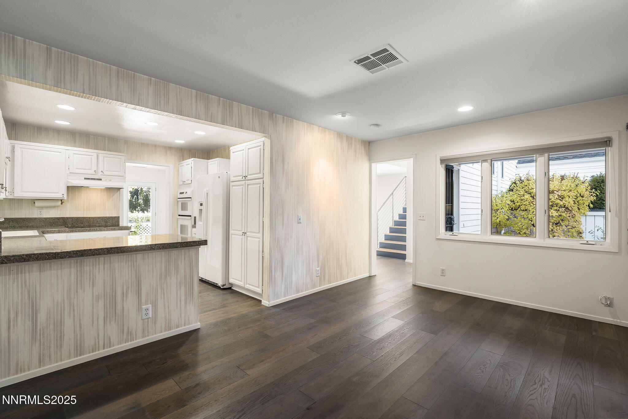 6302 Green Ranch Road Reno, NV 89519 - Photo 5 of 26 a view of kitchen with wooden floor and electronic appliances