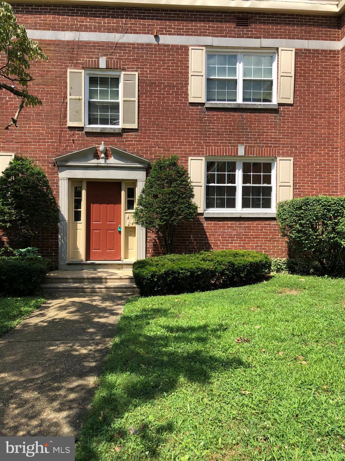 100 Park Boulevard, Unit 75B Cherry Hill, NJ 08034 - Photo 1 of 12 a front view of a house with a yard and garage