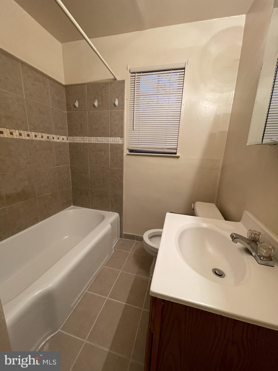100 Park Boulevard, Unit 75B Cherry Hill, NJ 08034 - Photo 6 of 12 a bathroom with a bathtub sink and mirror