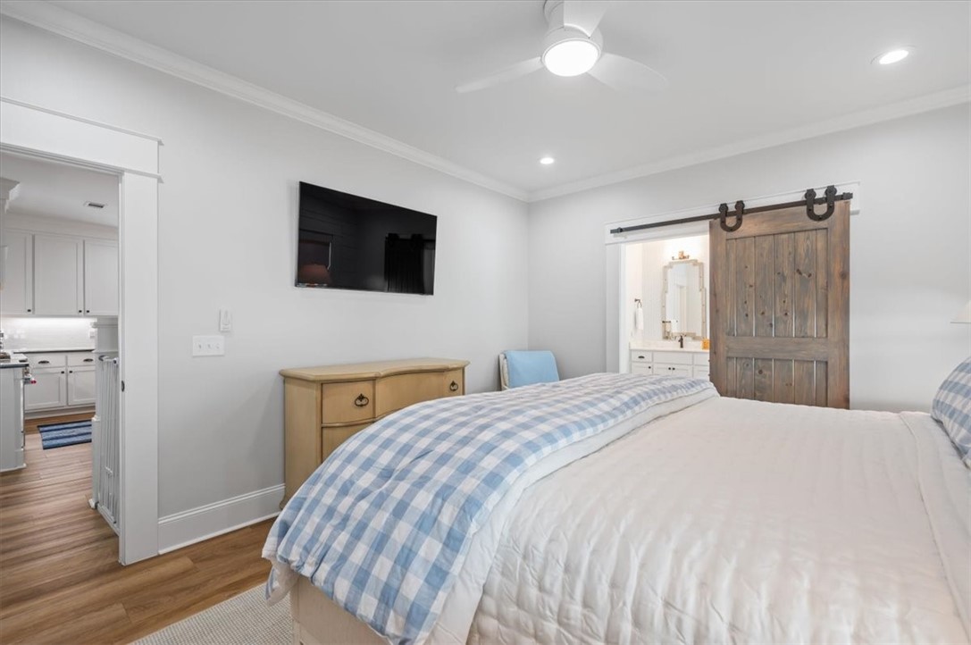 409 Kelsall Avenue St. Simons Island, GA 31522 - Photo 20 of 54 Primary bedroom on Main