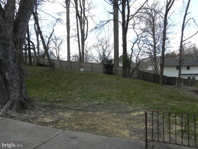 13006 Tamarack Road Silver Spring, MD 20904 - Photo 2 of 21 a backyard of a house with lots of green space