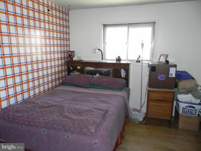 13006 Tamarack Road Silver Spring, MD 20904 - Photo 18 of 21 a bed room with a bed and a window
