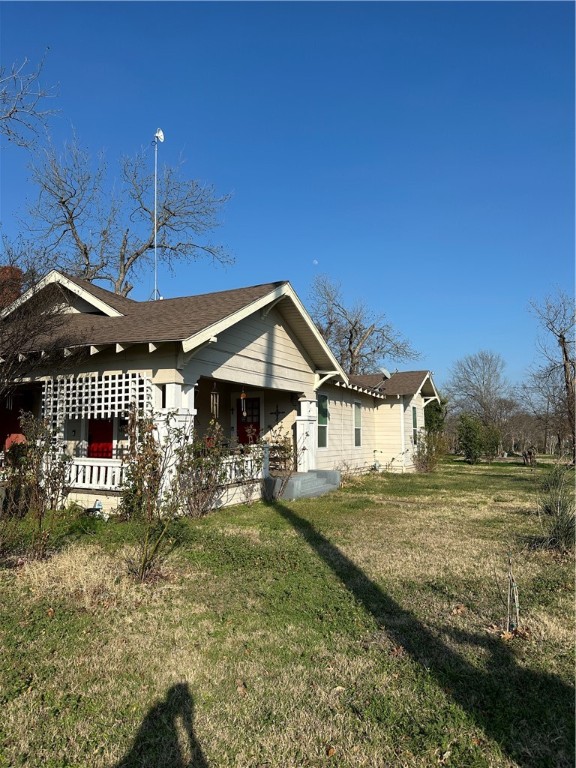 800 Ward Street Marlin, TX 76661 - Photo 3 of 22 a front view of a house with a yard