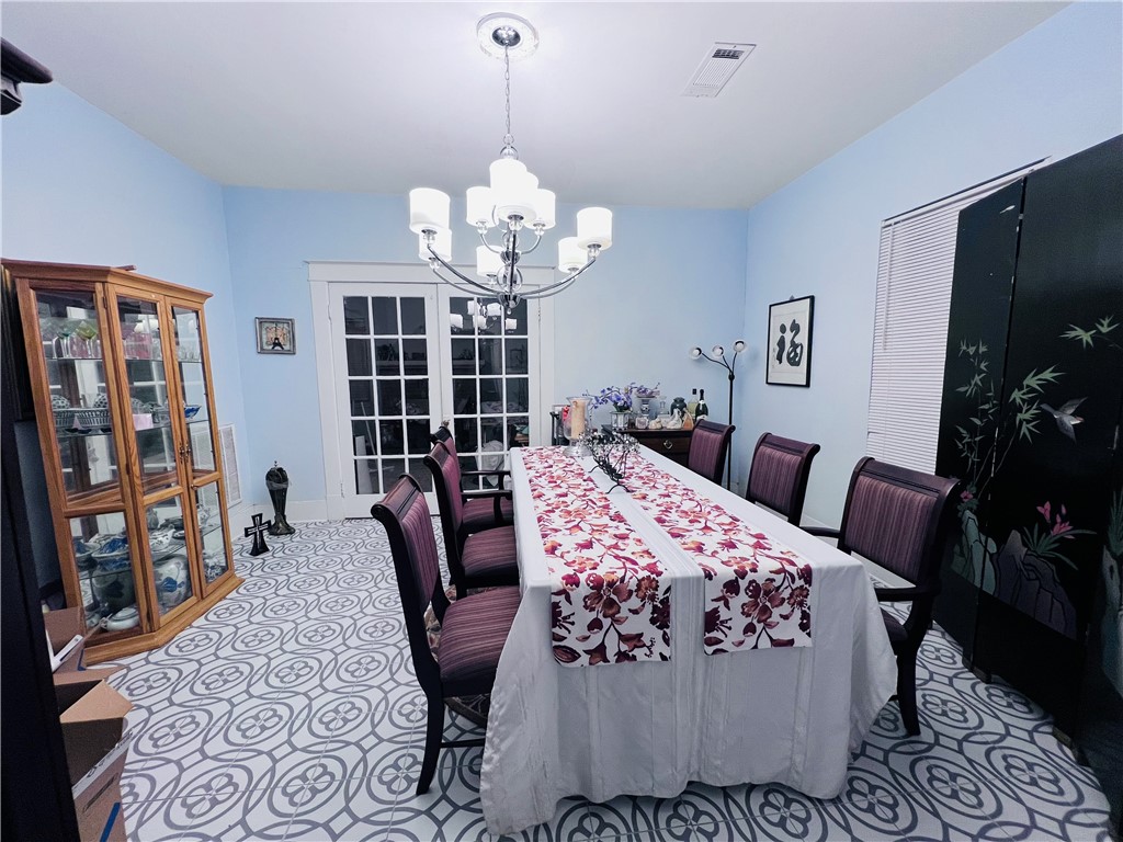 800 Ward Street Marlin, TX 76661 - Photo 6 of 22 a bedroom with a bed and wooden floor