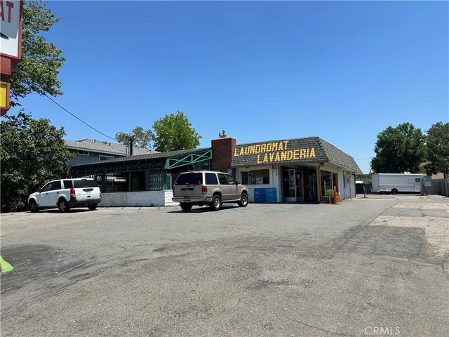 a view of a street with cars