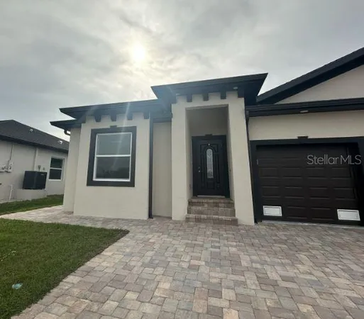 a view of house with yard