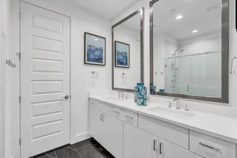 a bathroom with a sink and mirror