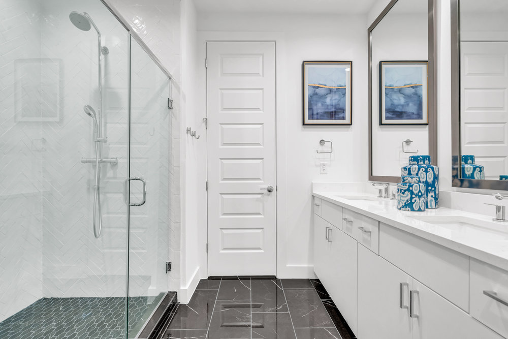 2505 Bluebonnet Lane, Unit 5 Austin, TX 78704 - Photo 21 of 35 a bathroom with a sink and mirror