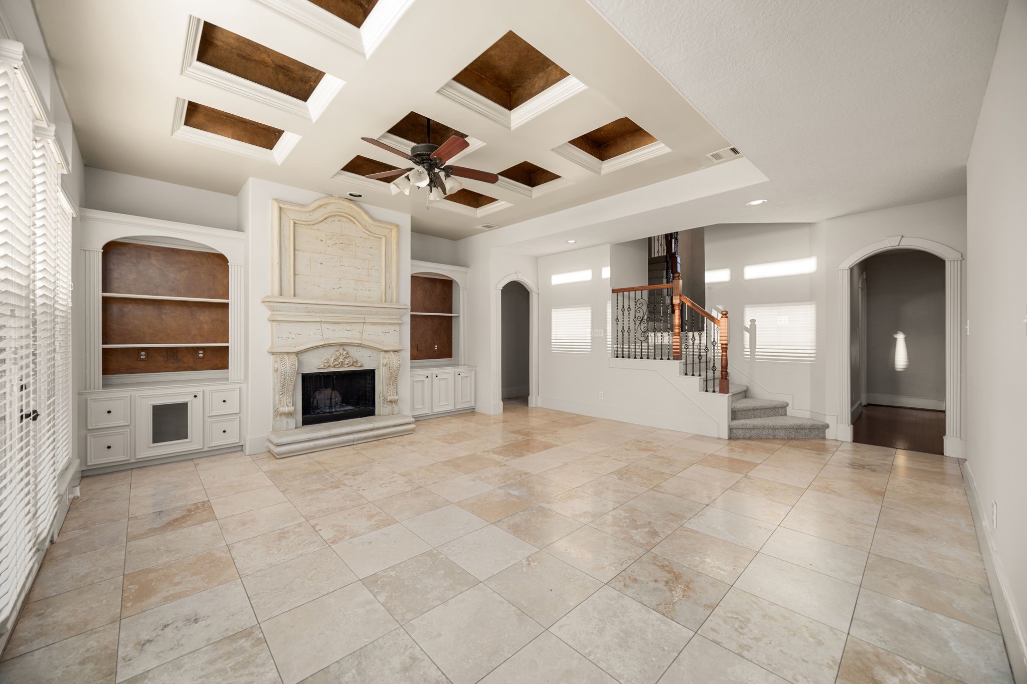 18921 Mountain Spring Drive Spring, TX 77379 - Photo 13 of 40 a view of a livingroom with a fireplace and a ceiling fan