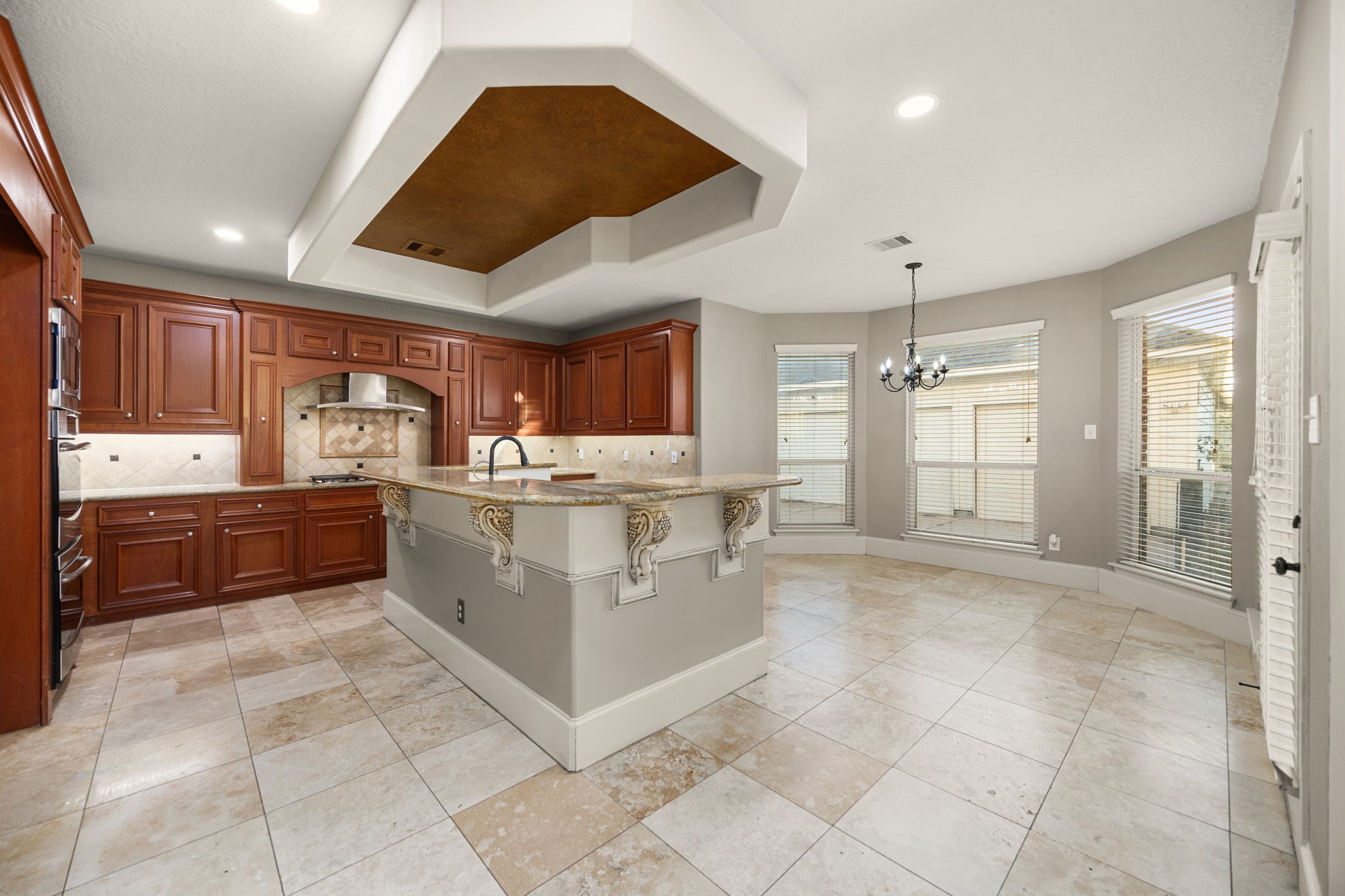 18921 Mountain Spring Drive Spring, TX 77379 - Photo 14 of 40 a kitchen with a cabinets and window