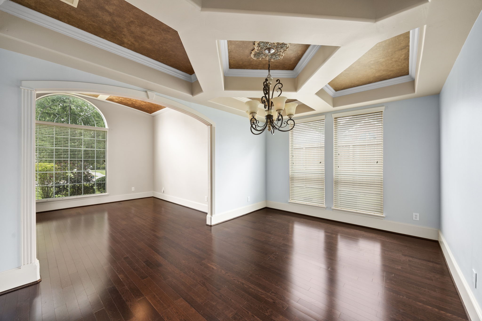18921 Mountain Spring Drive Spring, TX 77379 - Photo 22 of 40 a view of an empty room with wooden floor and a window