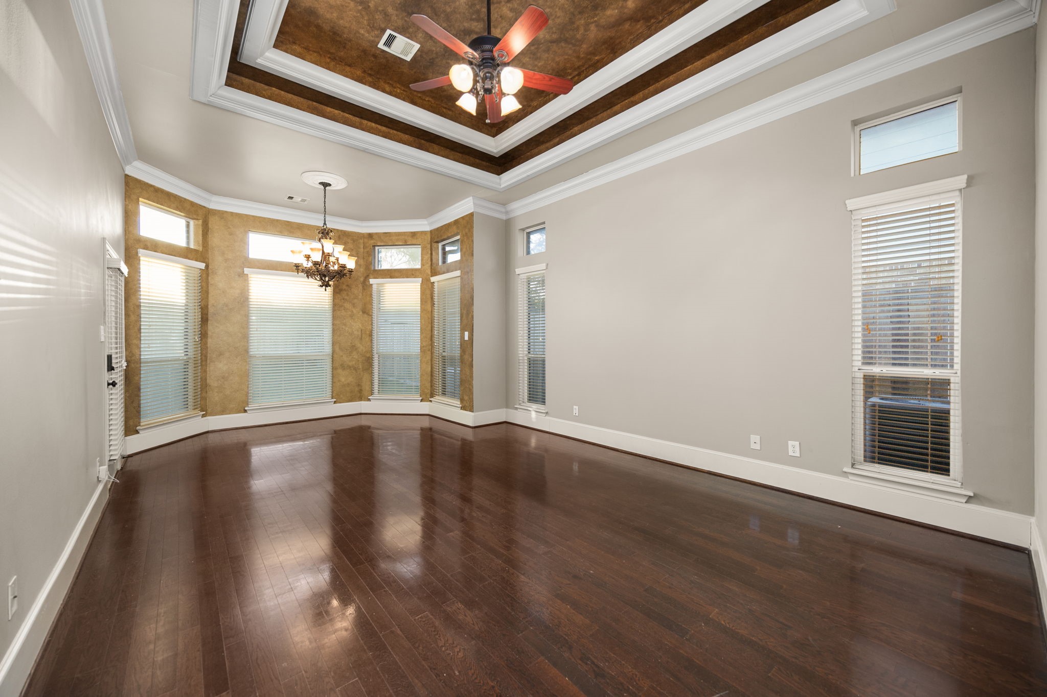 18921 Mountain Spring Drive Spring, TX 77379 - Photo 24 of 40 a view of an empty room with wooden floor and a window