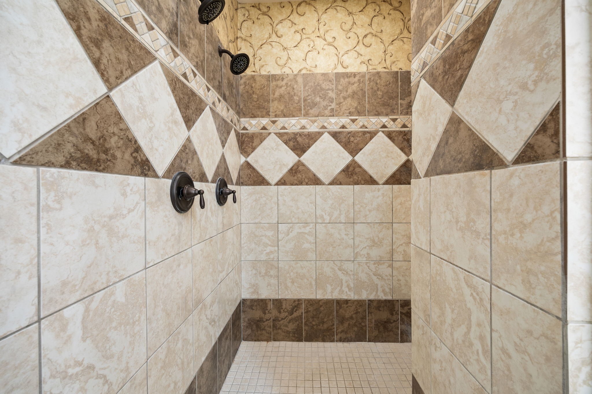 18921 Mountain Spring Drive Spring, TX 77379 - Photo 26 of 40 a bathroom with a shower and a window