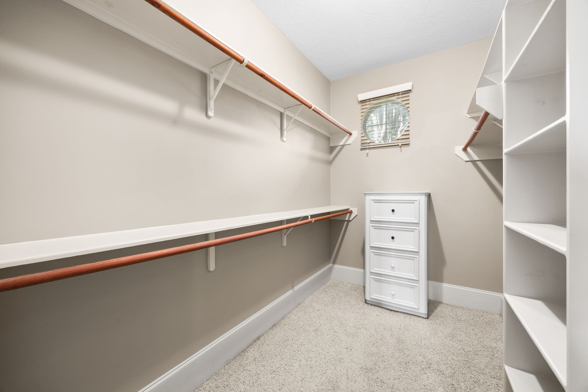 18921 Mountain Spring Drive Spring, TX 77379 - Photo 29 of 40 a kitchen with cabinets and a wooden floors
