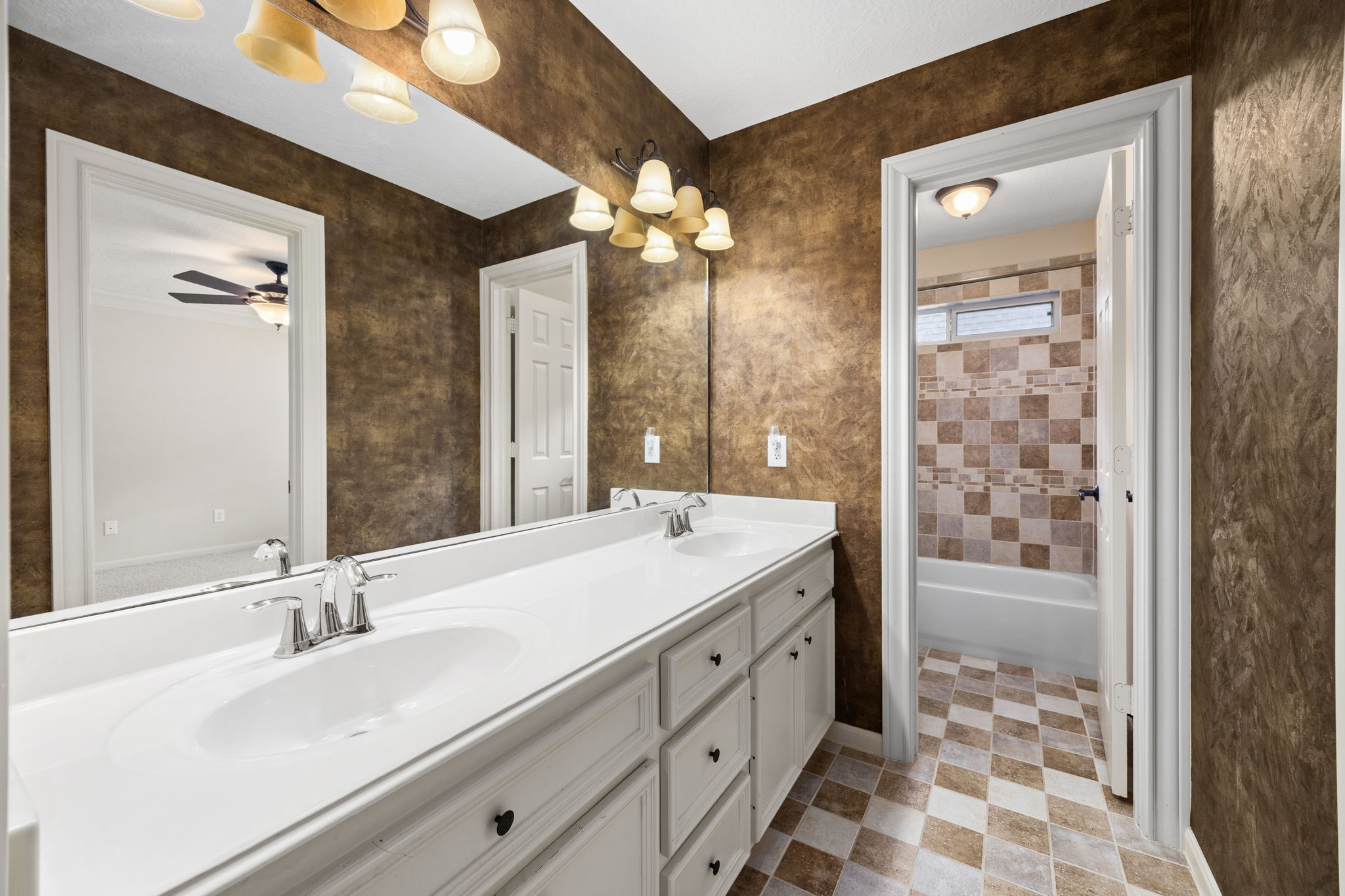 18921 Mountain Spring Drive Spring, TX 77379 - Photo 38 of 40 a bathroom with a sink double vanity and a shower