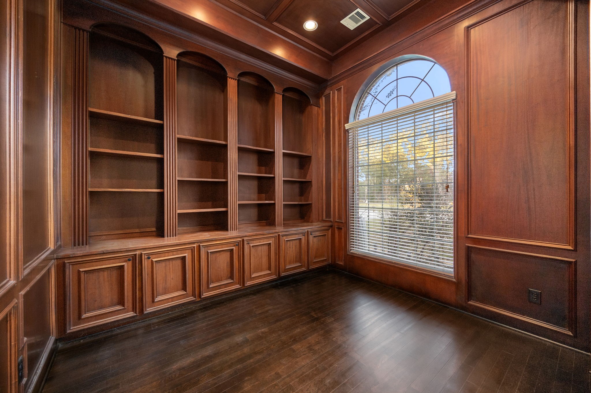 18921 Mountain Spring Drive Spring, TX 77379 - Photo 8 of 40 a view of an empty room with wooden floor and a window