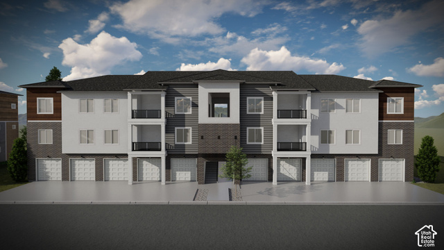 4772 North 650 West, Unit AA304 Mapleton, UT 84664 - Photo 2 of 3 Modern facade featuring a balanced mix of light and dark siding, brick accents, multiple balconies with black railings, and integrated garages with white doors