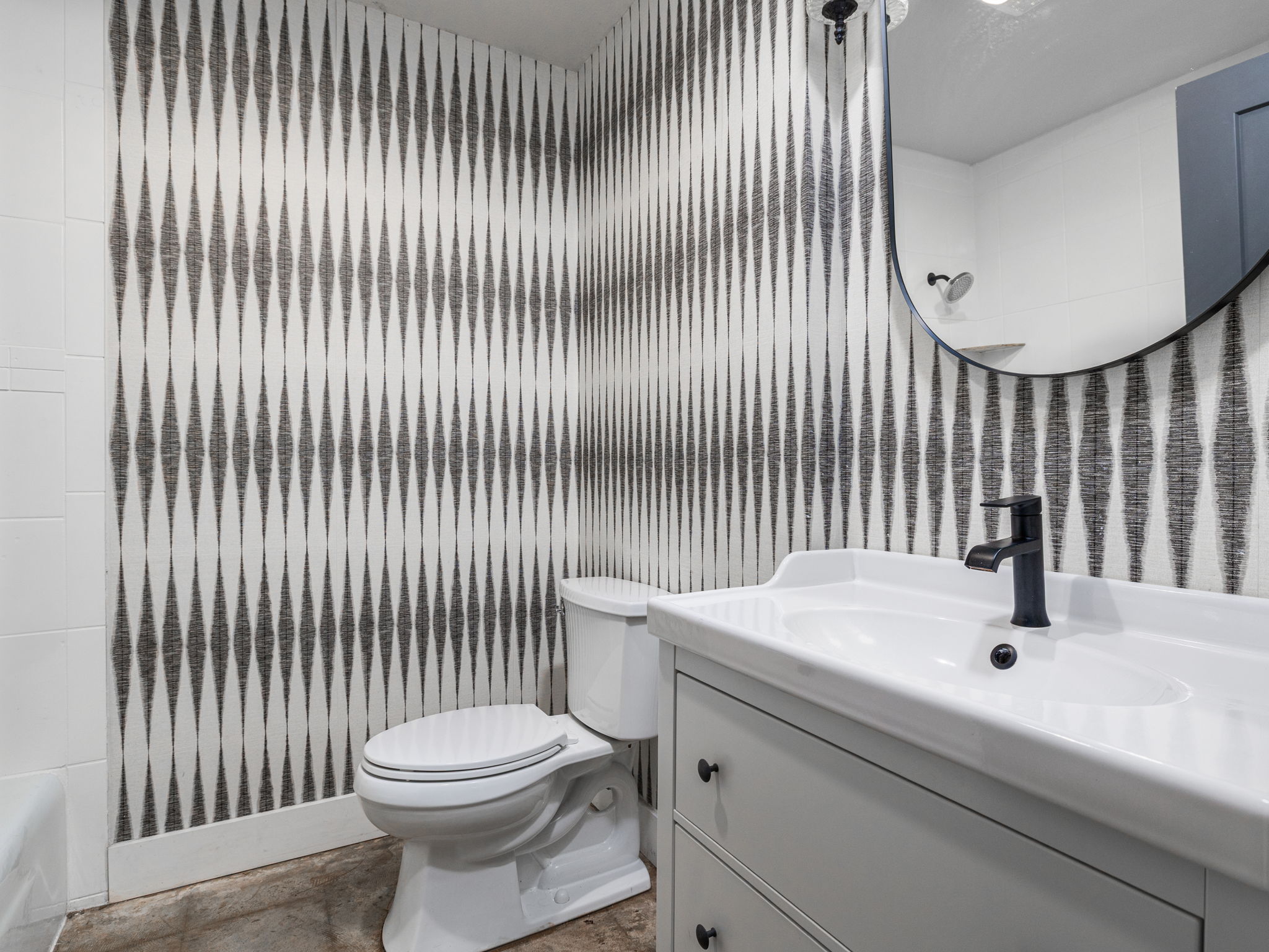 9506 Mountain Quail Road Austin, TX 78758 - Photo 13 of 19 Hall bathroom has been tastefully redone.