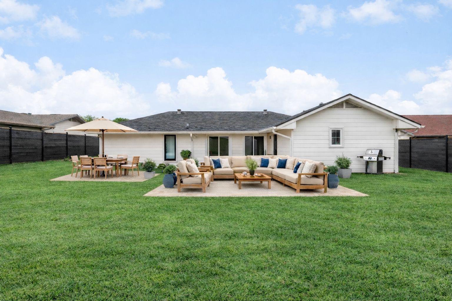 9506 Mountain Quail Road Austin, TX 78758 - Photo 15 of 19 Rear view of property featuring a fenced backyard, and patio area.