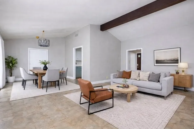 a living room with furniture and a couch