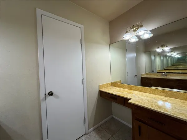 a room with table and chandelier