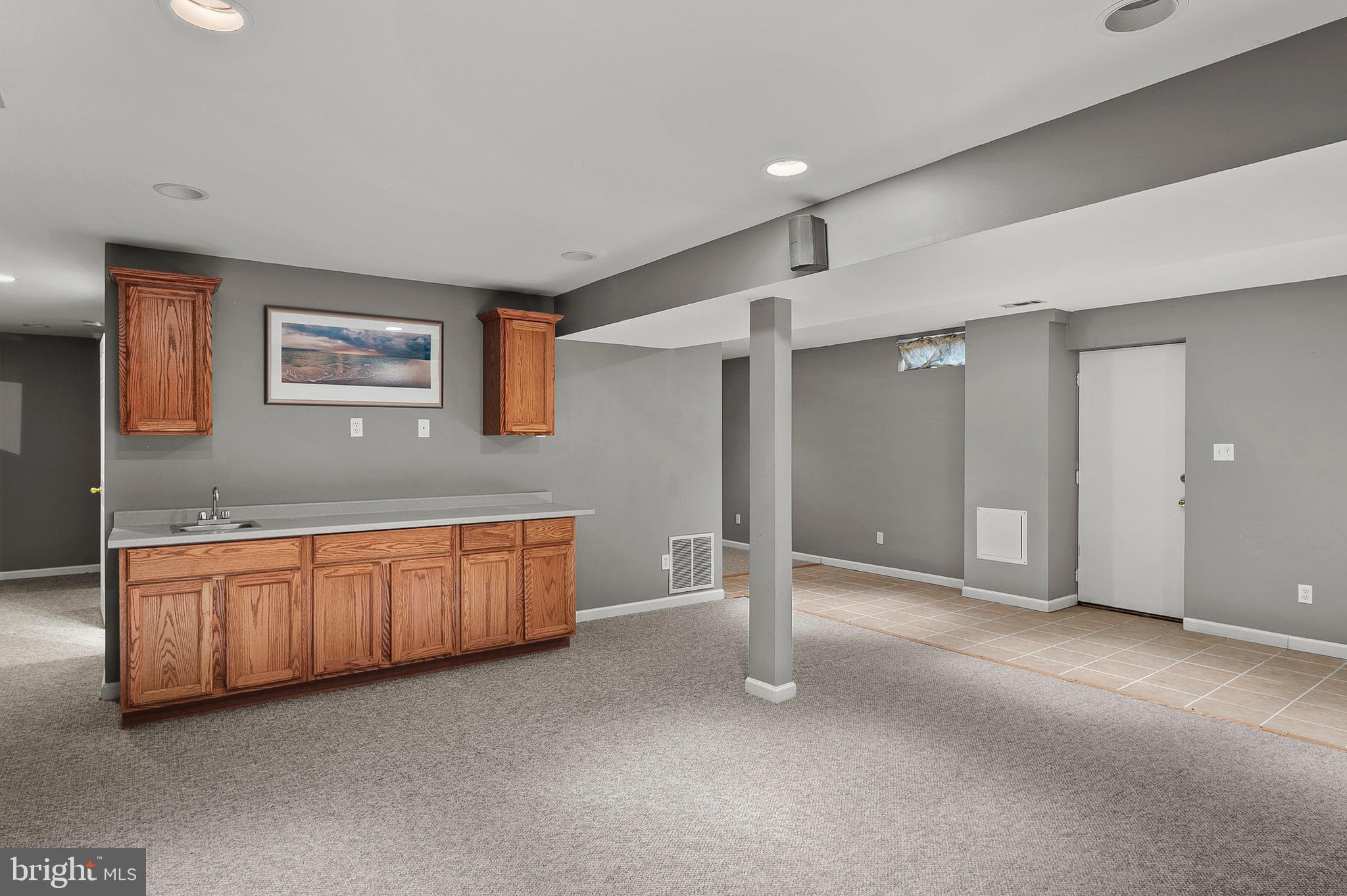 1508 Fairlakes Place Bowie, MD 20721 - Photo 36 of 51 a view of an empty room with window and cabinet