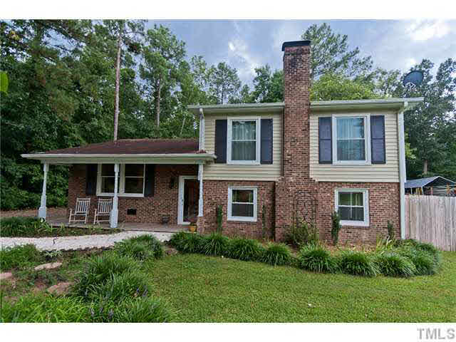 1530 Clermont Road Durham, NC 27713 - Photo 1 of 12 a front view of house with yard and green space