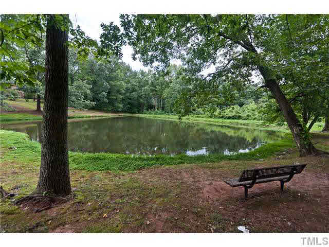 1530 Clermont Road Durham, NC 27713 - Photo 12 of 12 a park view with a bench in a park