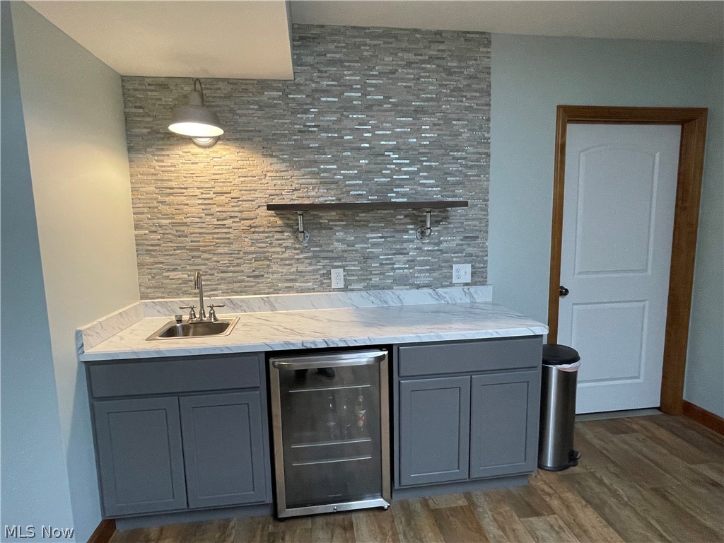 823 Forrest Ridge Drive Dover, OH 44622 - Photo 30 of 35 Lower level wet bar and storage area