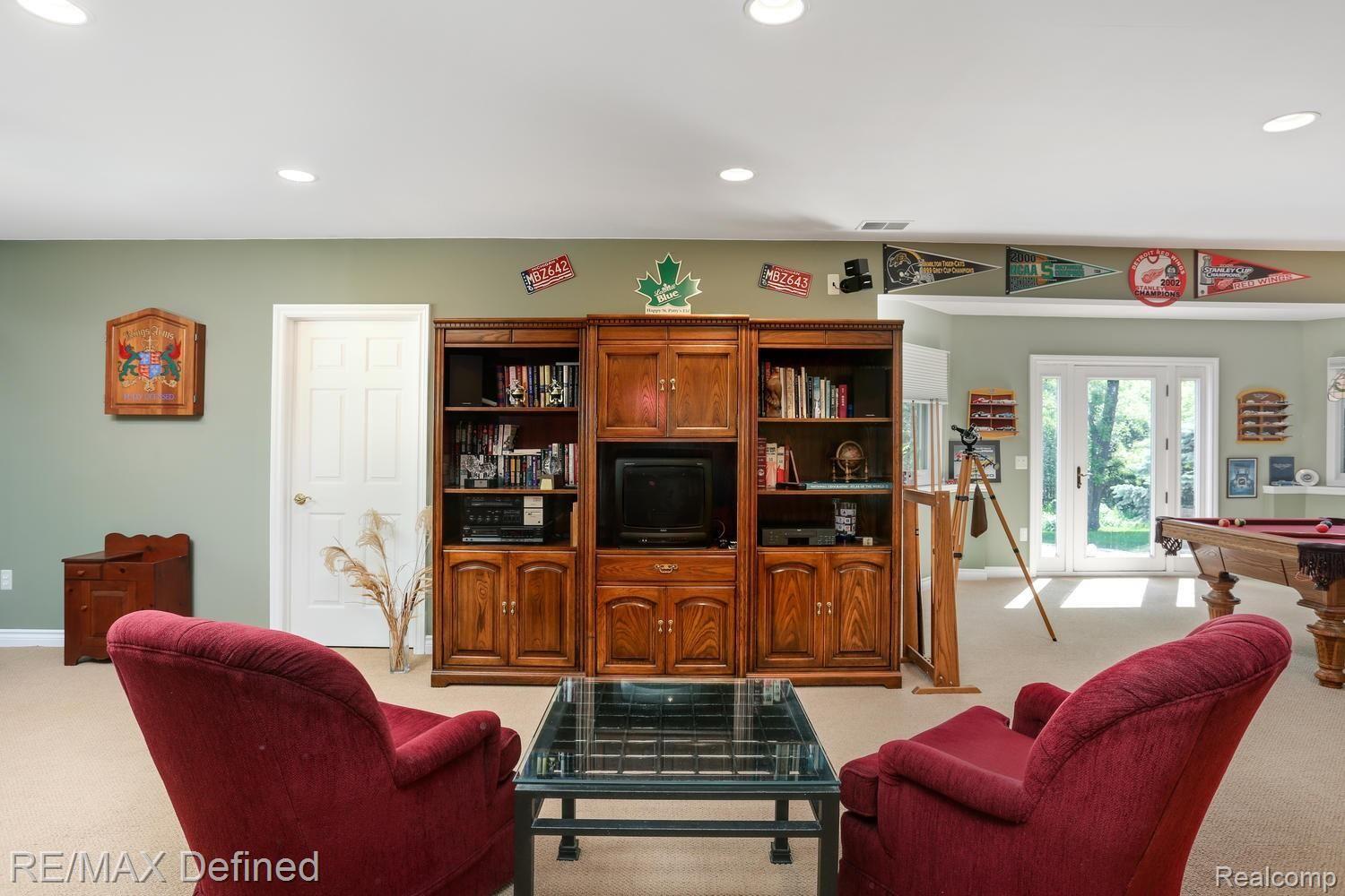 4205 Sheldon Road Rochester, MI 48306 - Photo 41 of 50 Enjoy the custom upgrades including recessed lighting, natural light from full windows and fresh carpet.