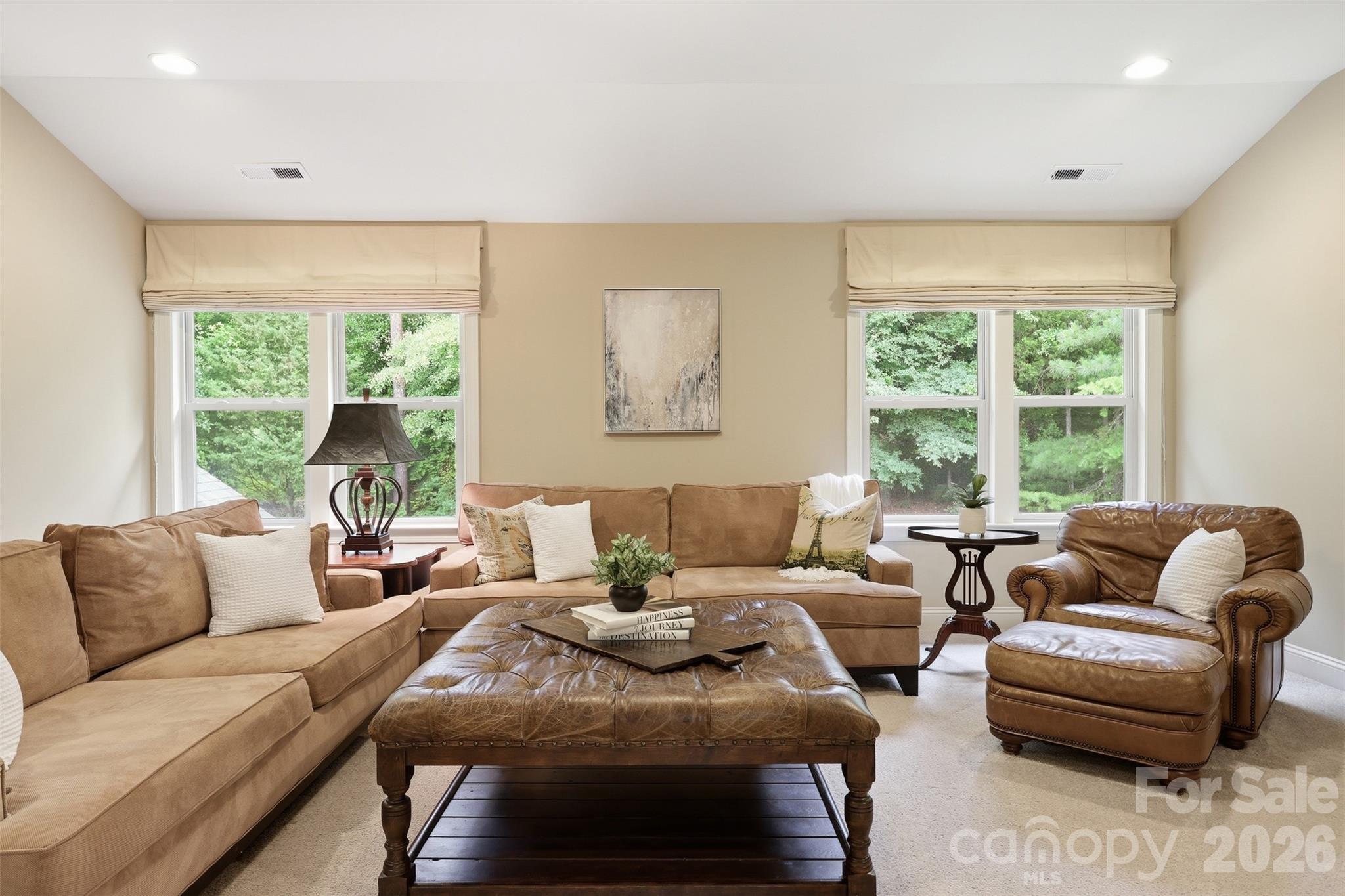 8094 Clems Branch Road Indian Land, SC 29707 - Photo 19 of 38 a living room with furniture and a large window
