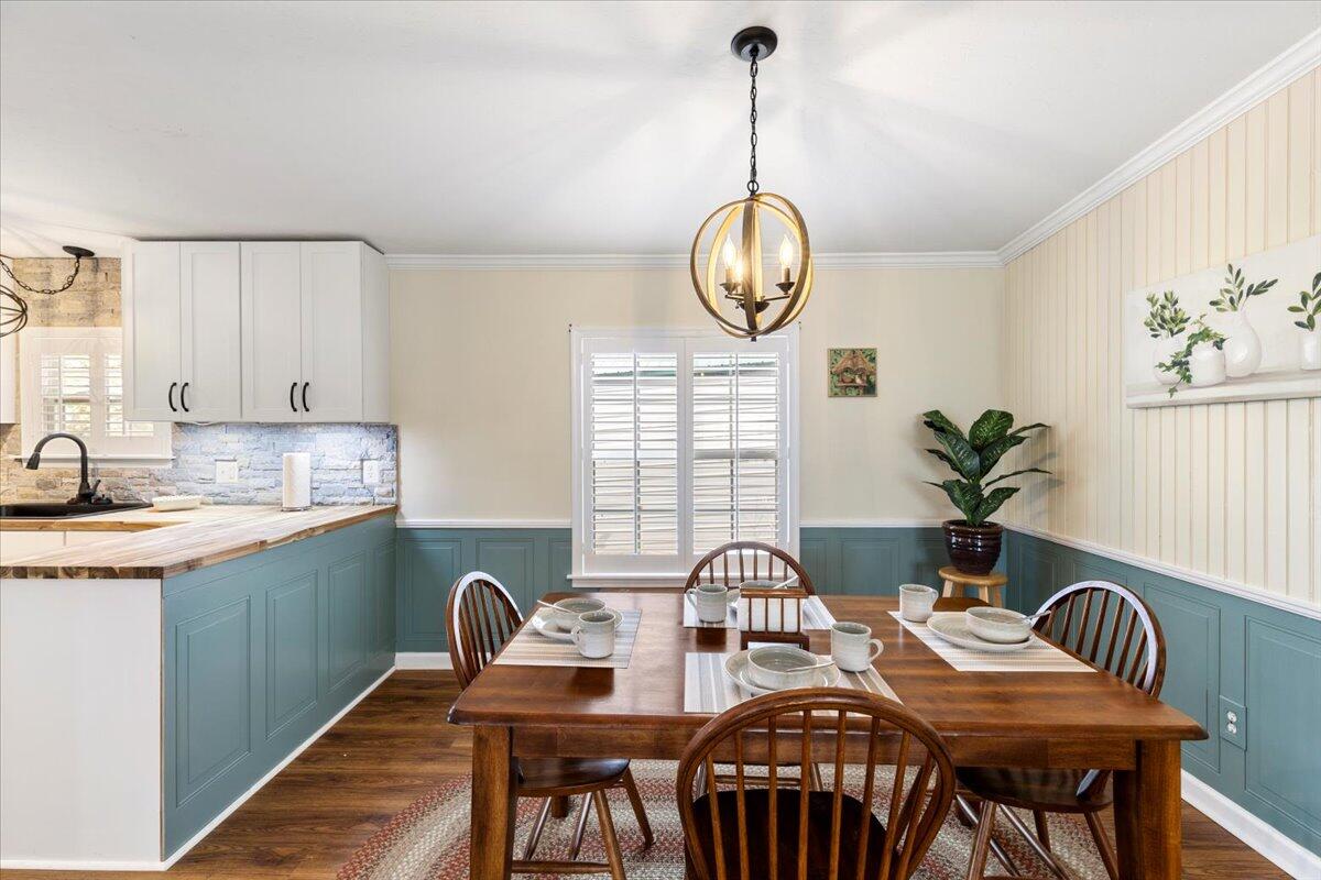 3729 Clark Road Hiwassee, VA 24347 - Photo 13 of 52 a view of a dining room with furniture window and wooden floor