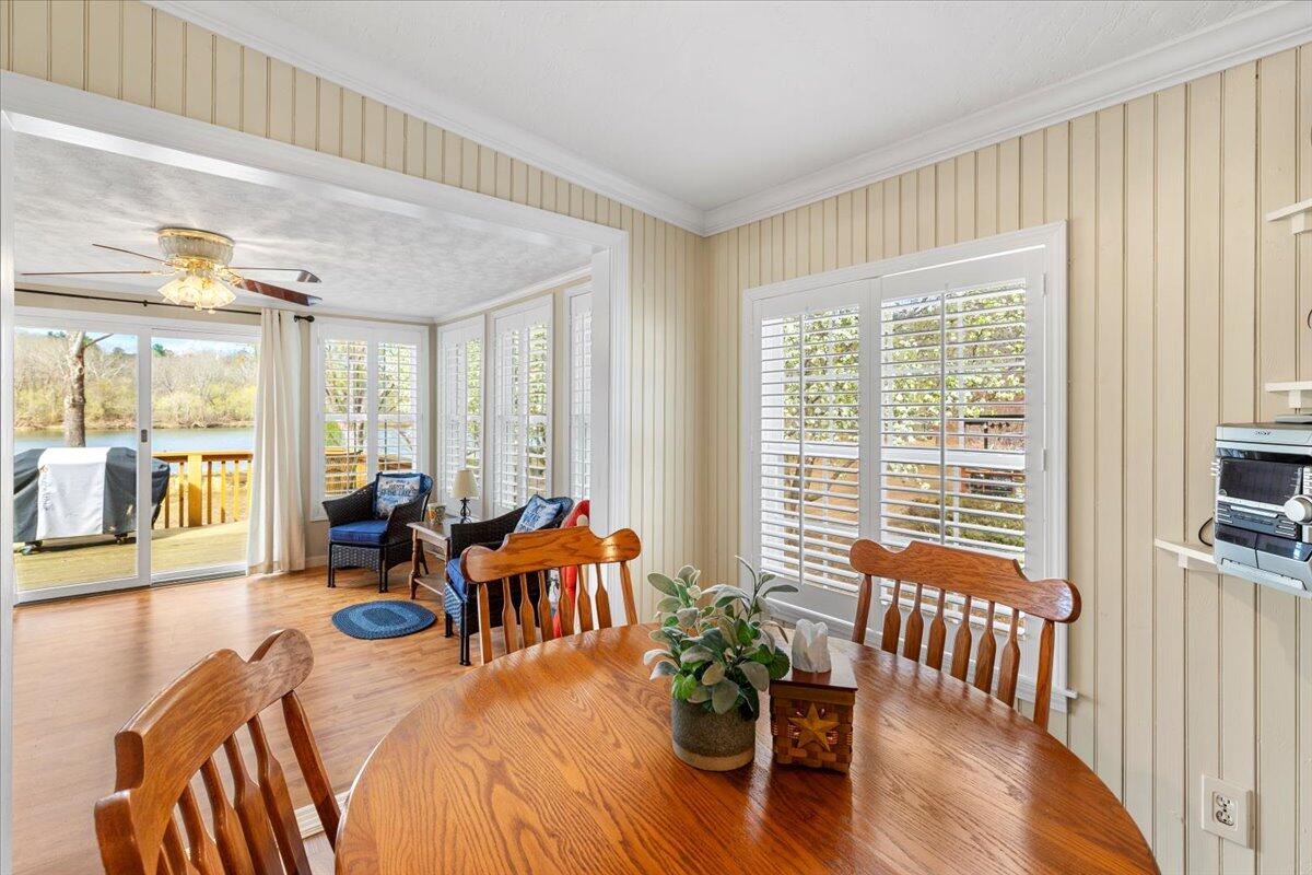 3729 Clark Road Hiwassee, VA 24347 - Photo 20 of 52 a living room with furniture and floor to ceiling windows