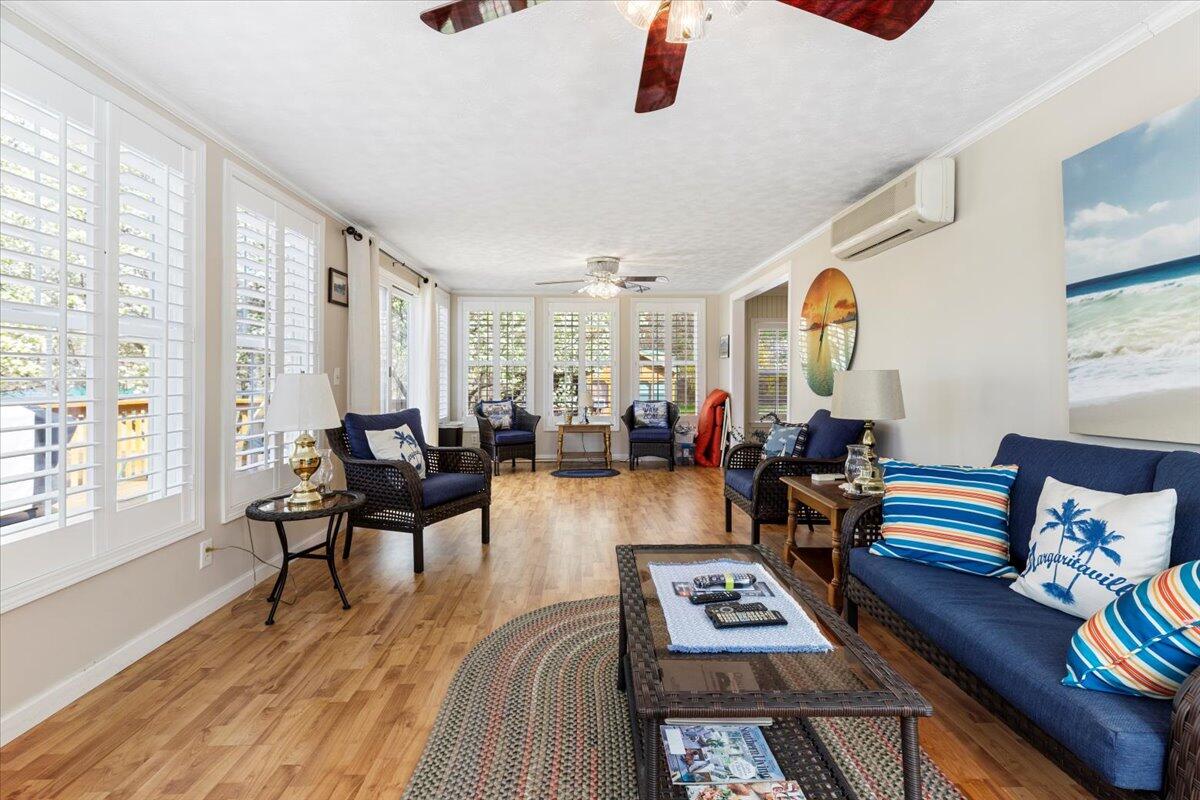 3729 Clark Road Hiwassee, VA 24347 - Photo 26 of 52 a living room with furniture and a wooden floor