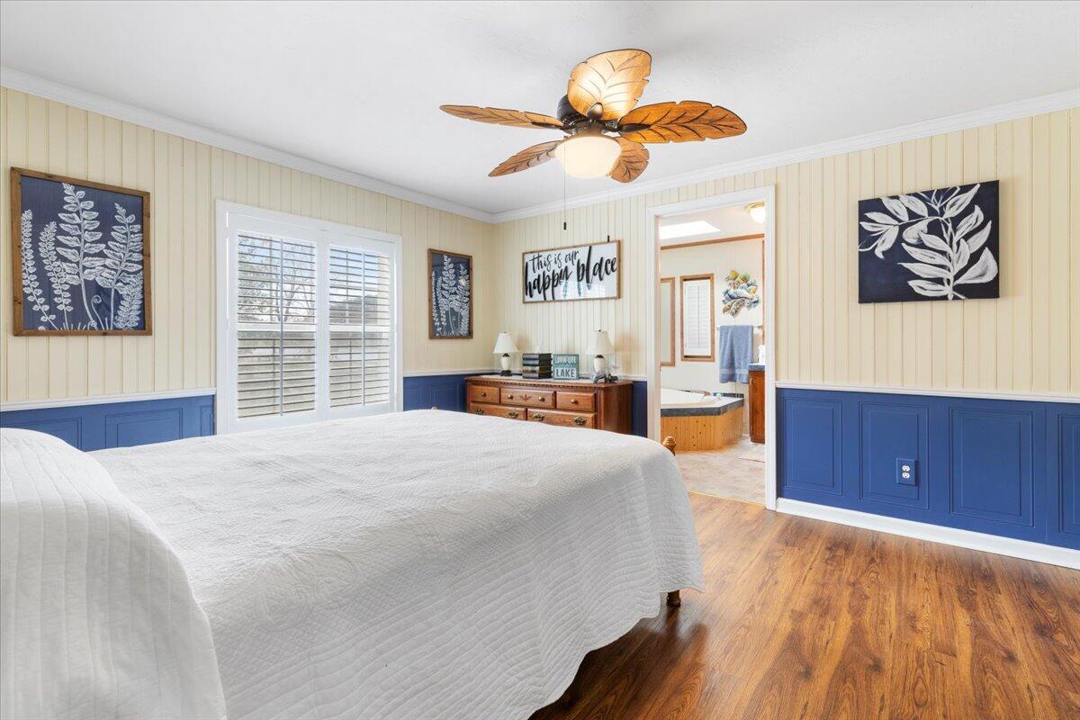 3729 Clark Road Hiwassee, VA 24347 - Photo 28 of 52 a bed room with a bed and a dresser