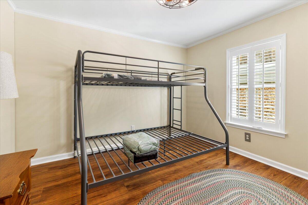 3729 Clark Road Hiwassee, VA 24347 - Photo 35 of 52 a view of an empty room with wooden floor and a window